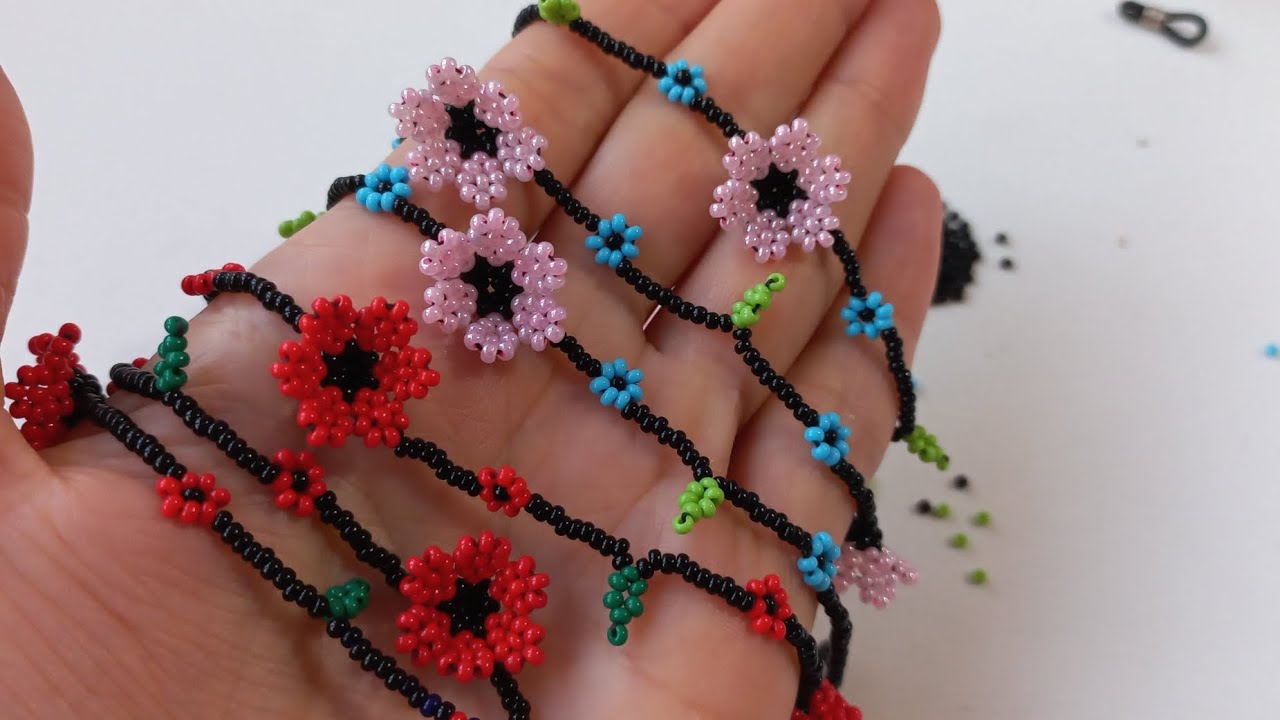 kumboncuktan çiçekli gözlük ipi yapımı ćok güzel bir model izleyin derim