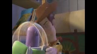 the famous woody and buzz scene but they fight with a game of mean bean machine