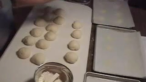 Shaping Kaiser Rolls with Kaiser Stamp