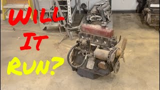 we try to start an mgb parts car engine... on the floor of the shop!