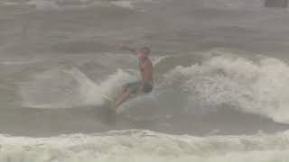 Raw: Surfers brave the waves as Tropical Storm Imelda lashes Galveston Island