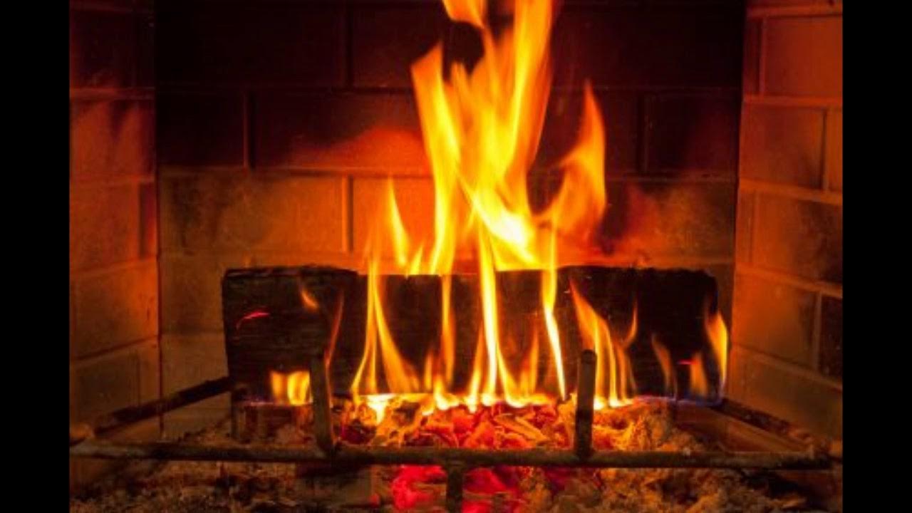 Огонь и дрова в камине. Горящие поленья. Заставка камин. Гори горит огонь в камине. Горящий камин.