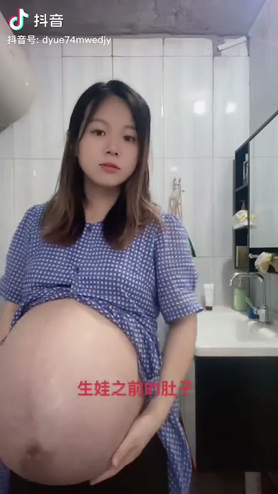 huge pregnant belly asian