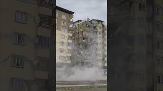 Implosion of a Damaged Building Captured on Camera