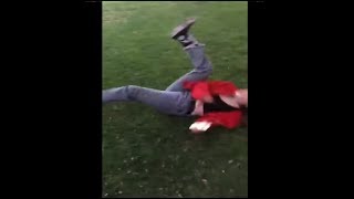 Guy Tackles His Friend With A Jacket