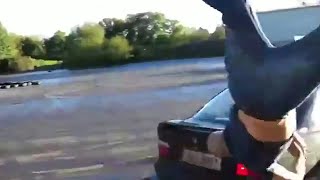 Moment drifting car spins out of control and sends man flying