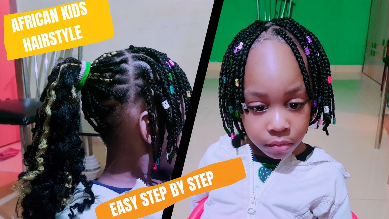 Boy in the african barbershop. Cute mixed boy makes a haircut in the African  salon. Hair style. Haircut by machine for children. School boy hair style.  Stock Photo | Adobe Stock