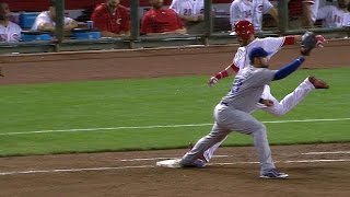 LAD@CIN: Suarez singles after Reds win challenge