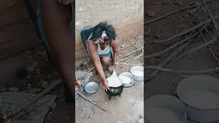 Young African  mom serving  porridge  the Traditional way🥰