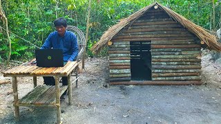 Alone, I build a wooden house and take a video of myself.