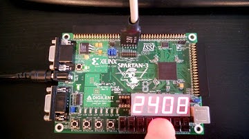Stopwatch on SPARTAN-3 Xilinx FPGA board.