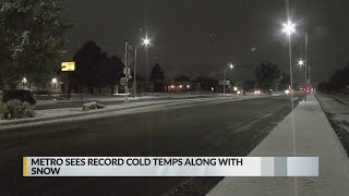 Snow continues to fall around Albuquerque