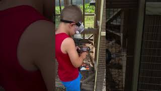 Farm kid working on his chicken coop expansion project!  #farm #farmlife #homestead #short