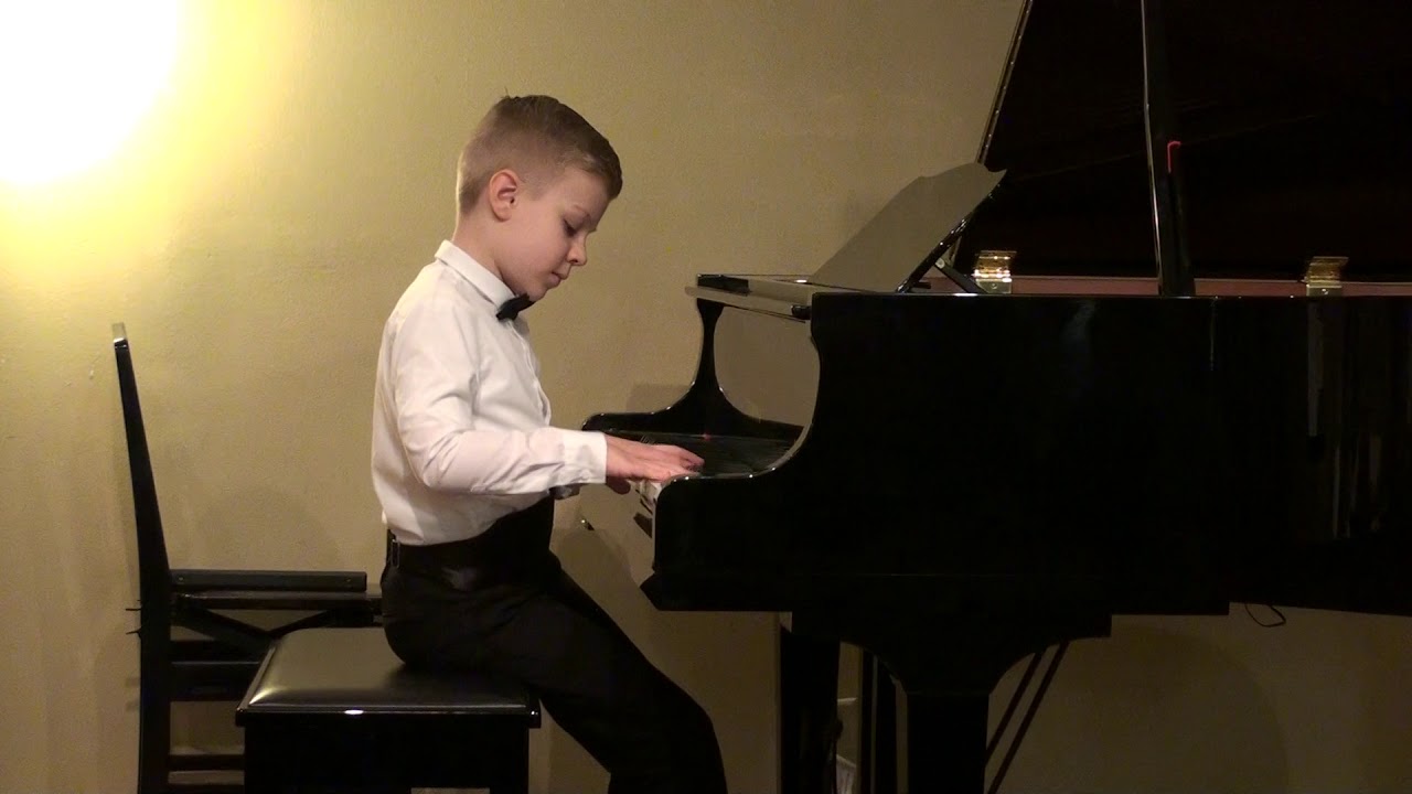 Liam Riddle (6 y.old) plays Schindler's List Theme and Santa Claus by R ...