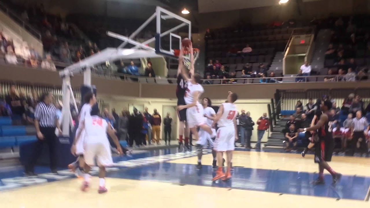 Michael Hurt 2 Handed dunk vs Osseo Rotary 2014