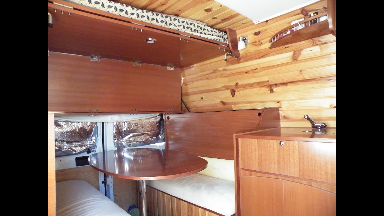 Fourgon camion aménagé camping car cuisine toilette douche lit