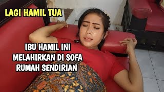 seconds of a pregnant woman giving birth alone at home naturally - Short pregnant film