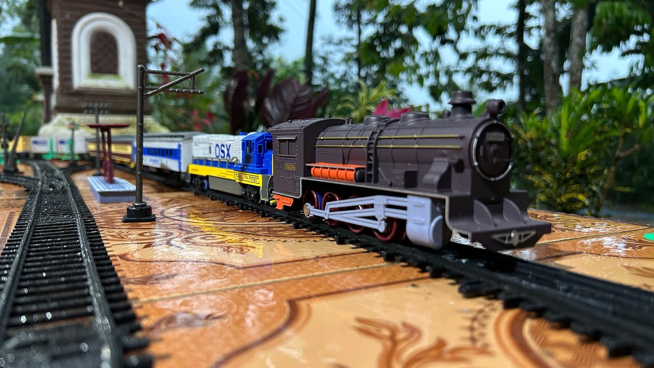 CLASSICAL STEAM TRAIN AND FENFA RAILCAR DIESEL LOCOMOTIVE PULLS DOZENS OF TRAIN CARS