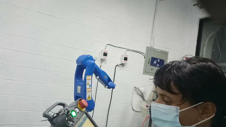 automatically move the robot arm on taught points. Play mode Yaskawa 1000 controller robot