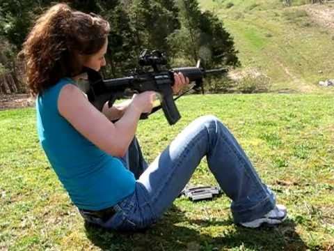 Melissa shoots a Colt M4 22lr again