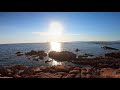 Coucher de soleil depuis une crique sauvage de la plage de la tonnara  bonifacio en corse du sud