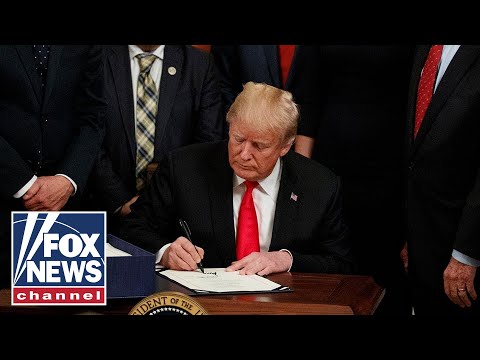 Trump reaffirms need for border wall funding, signs farm bill