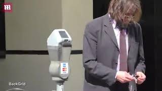 The Breakfast Club's Judd Nelson hops on motorcycle in suit and tie