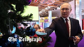 video: Putin tells teenager he believes in Santa like 'all normal, decent people'