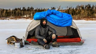 Camping On Frozen Lake With Tent In Freezing Temperatures