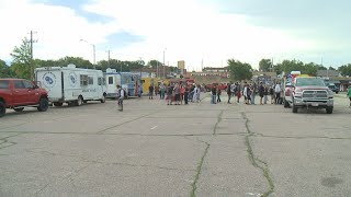 Local food trucks team up to give back to those in need