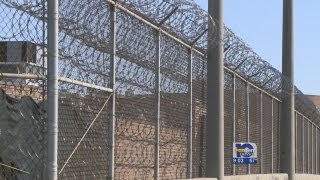 man back behind bars again