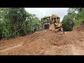 Cliffside road widening using caterpillar bulldozer d6r xl machine