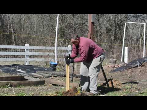 How to dig post holes by hand using a manual post hole digger