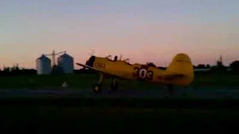 1943 Timm N2T-1 navy trainer landing at dusk
