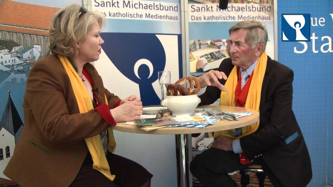 Alois Glück beim Katholikentagsstand des Erzbistums München und Freising präsidenten usa