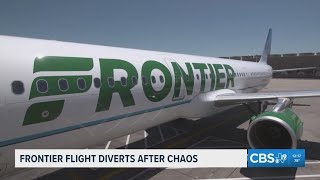 Frontier flight diverted after passenger allegedly tries to open doors