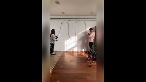 Wireless tool for pulling a cable through a pipe