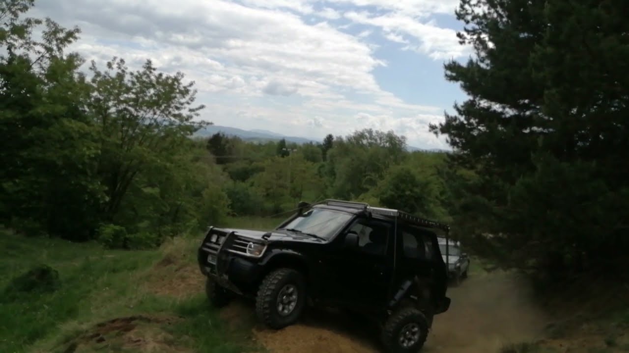 Offroad Adventure: Driving and Jumping on Rugged Terrain