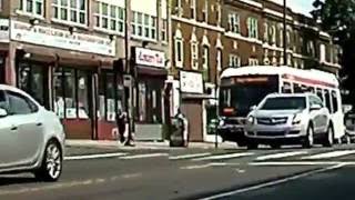 Dash Cam captures belligerent guy standing on a Septa bus bumper...