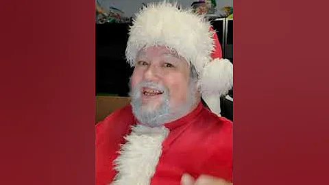 Singing Santa presents  "It's Beginning to look a lot like Christmas" in the style of Perry Como