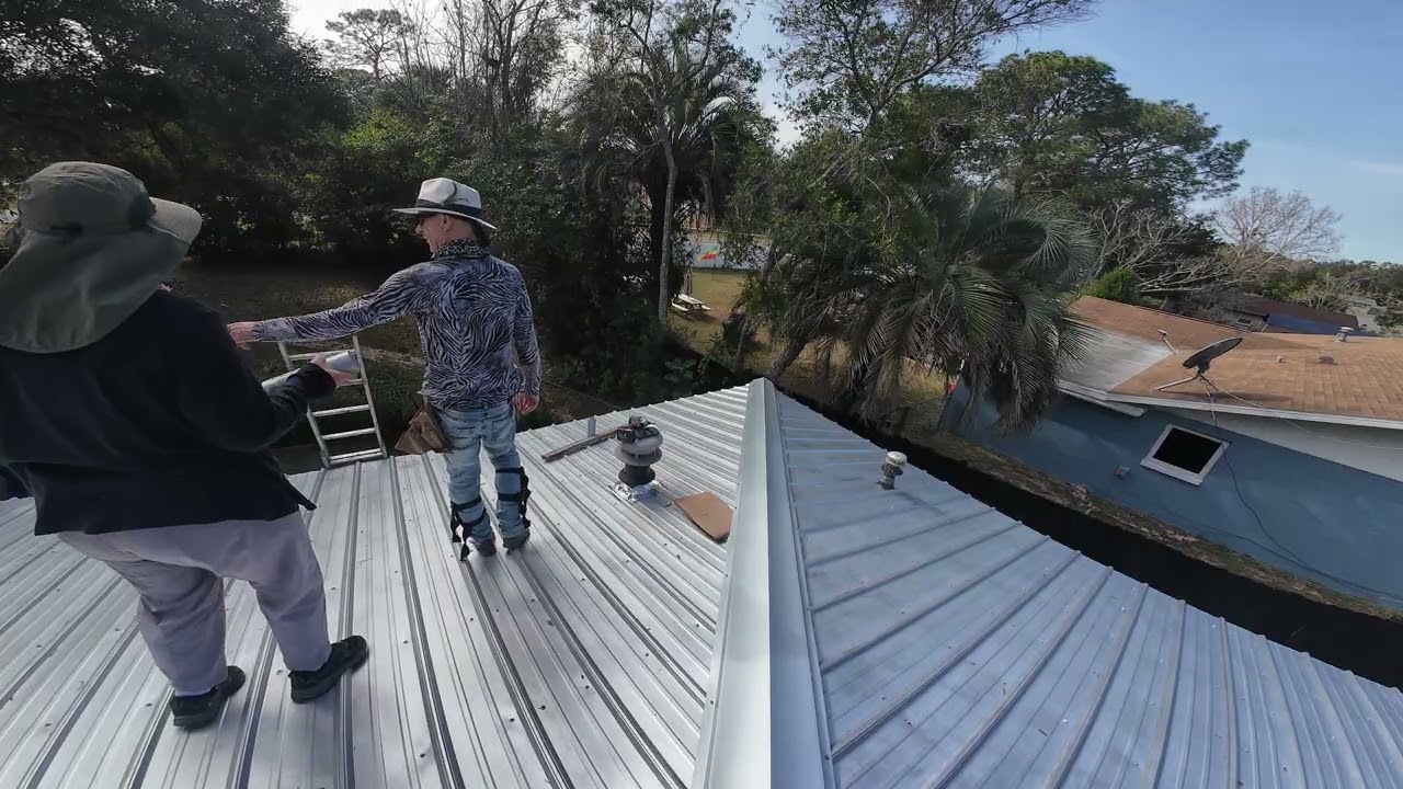 metal roof install  spray paint vent pipes