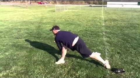 Casey DeHart demonstrates pitching follow-through drill