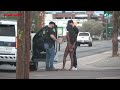 Phoenix police kidnap a woman off the public sidewalk