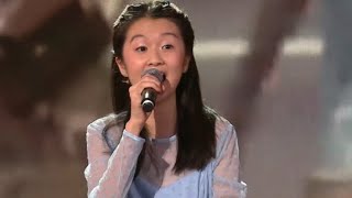юная китаянка Сюй Мохань исполняет песню птица счастья.