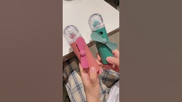 Quạt cầm tay mini kèm phun sương tạo độ ẩm