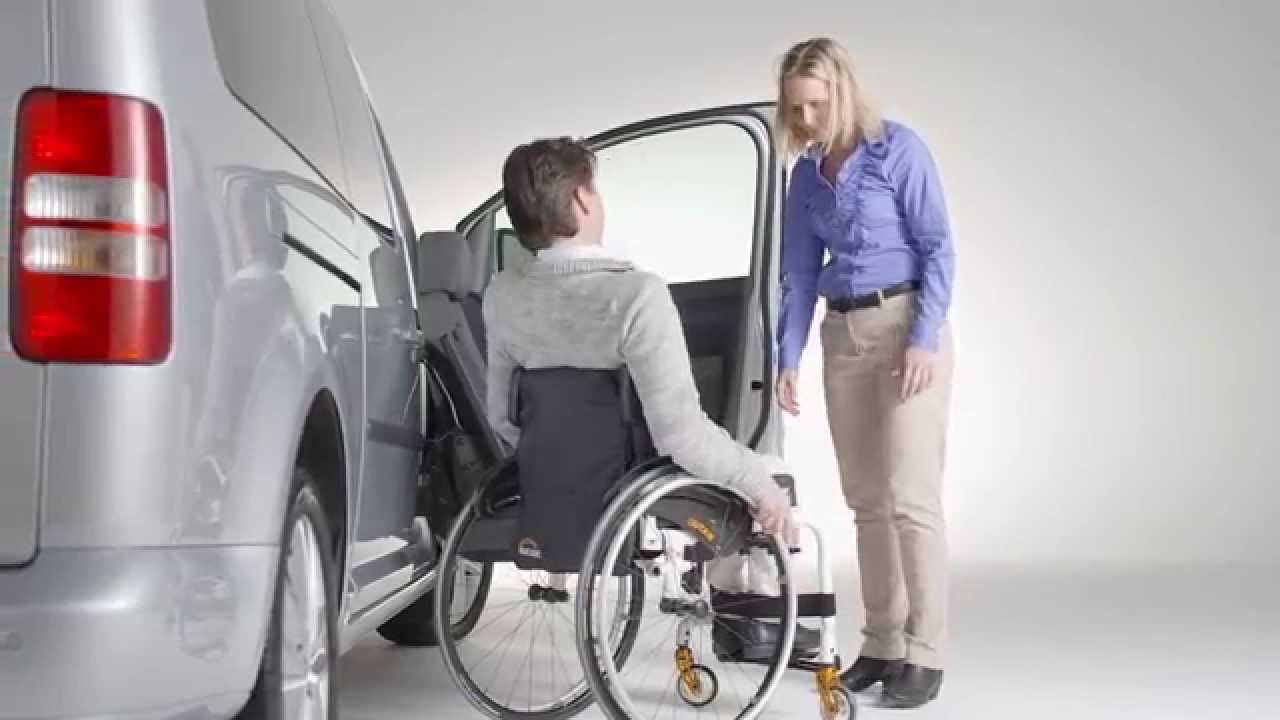 Wheelchair transfer to car with seat lift - YouTube