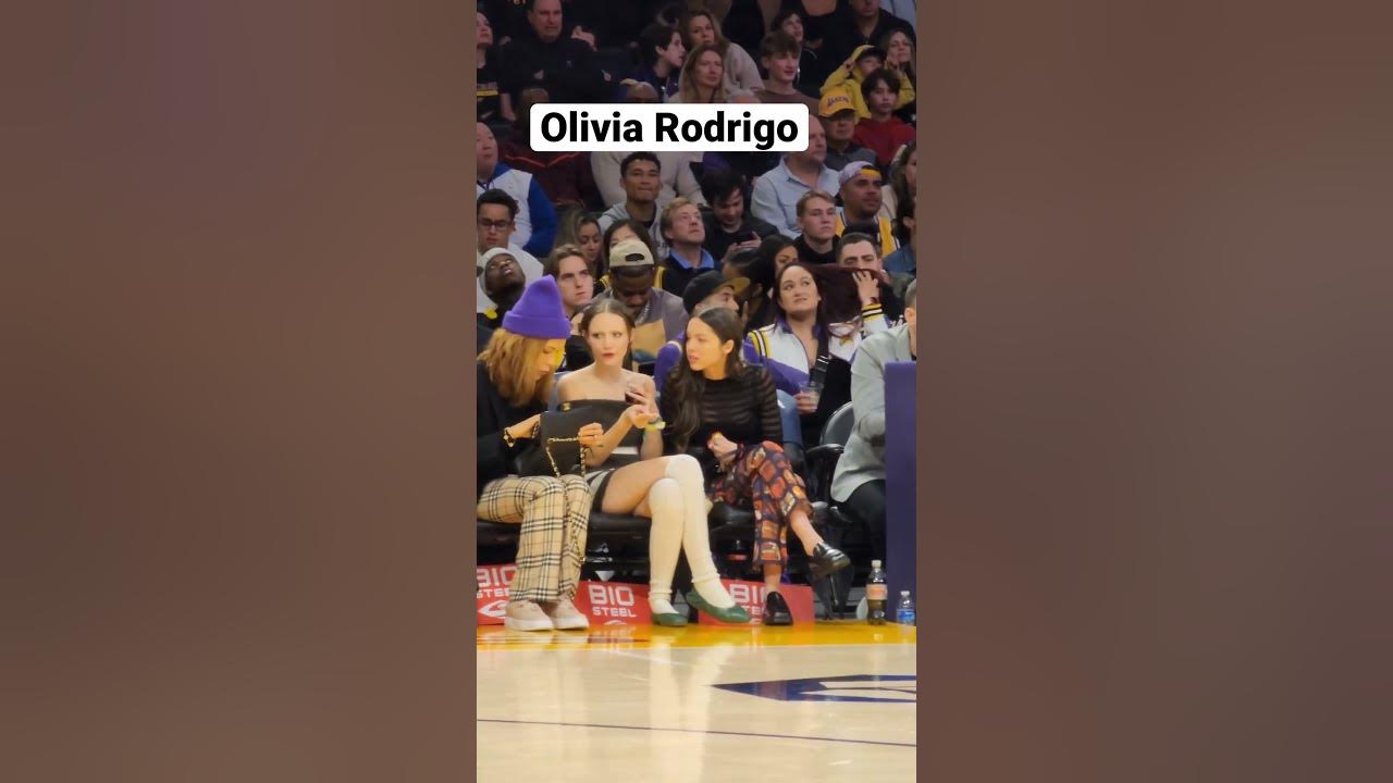 Olivia Rodrigo Cheers Courtside at Lakers Game in Sheer Top