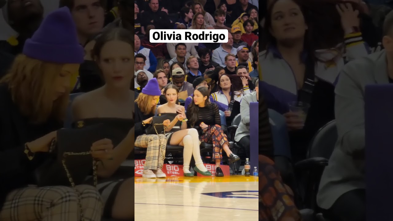 Olivia Rodrigo Cheers Courtside at Lakers Game in Sheer Top