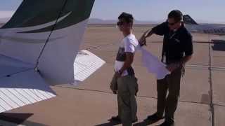 20140520 First SOLO!! My instructor is cutting my shirt!