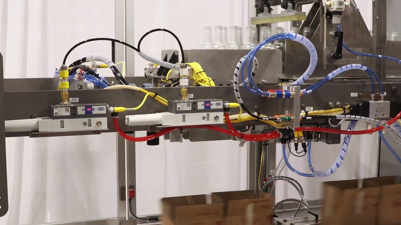 Hamrick Packaging Systems -600D-S Drop Packer Packing Glass Bottles Neck Upside Down for a Co-Packer